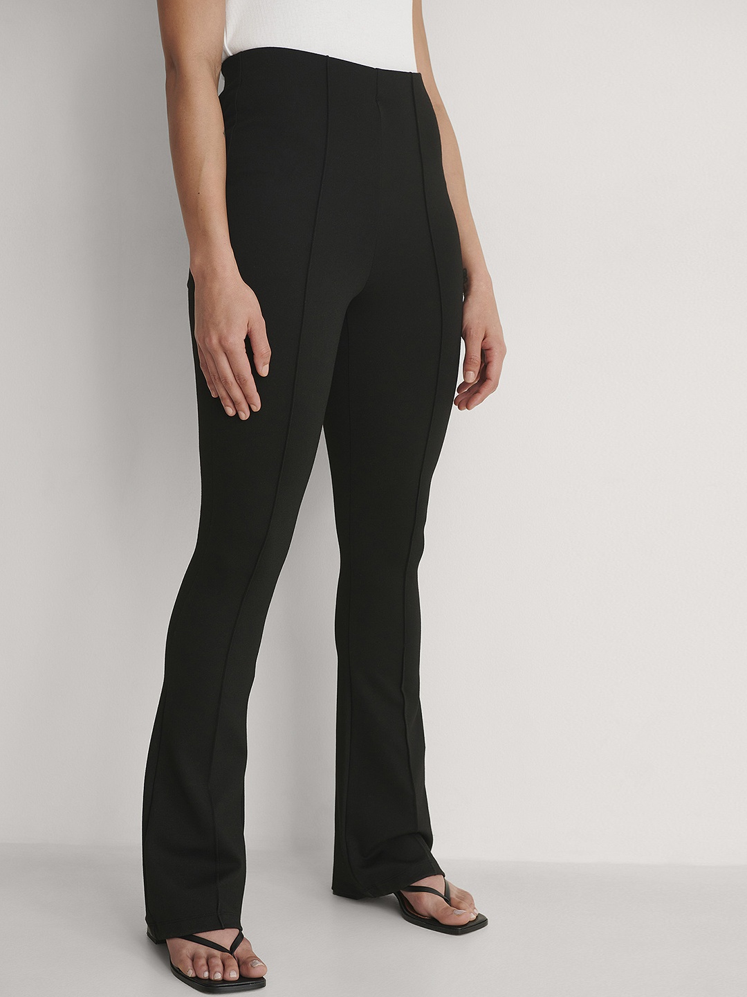 

NA-KD Women Black Solid Flared Trousers
