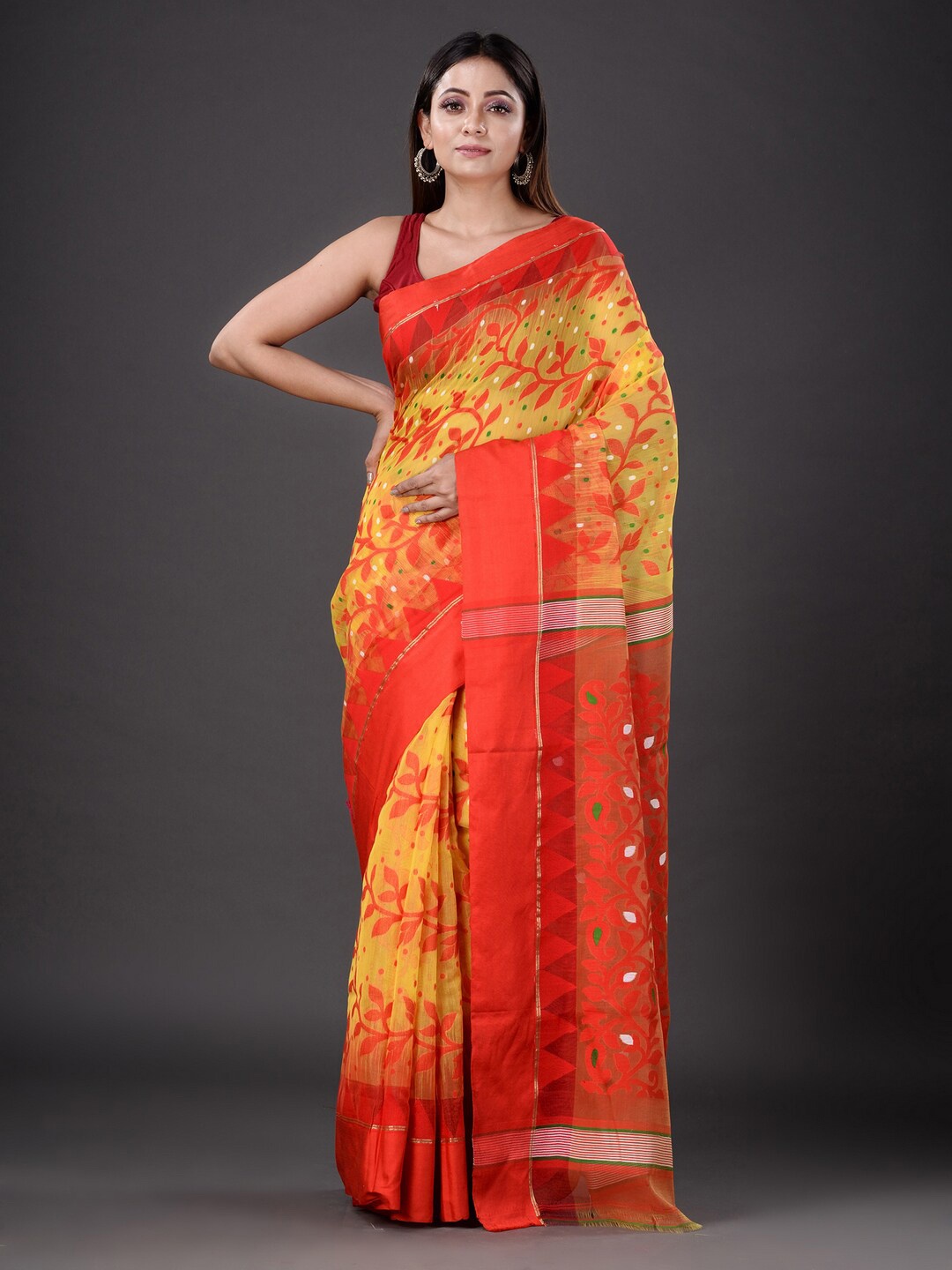 

Mitera Yellow & Orange Floral Silk Cotton Jamdani Saree