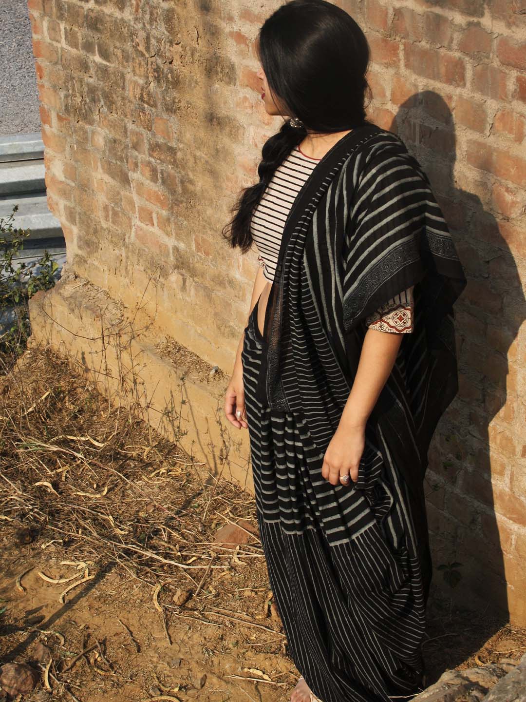 

Chidiyaa Black & Silver-Toned Striped Pure Cotton Saree