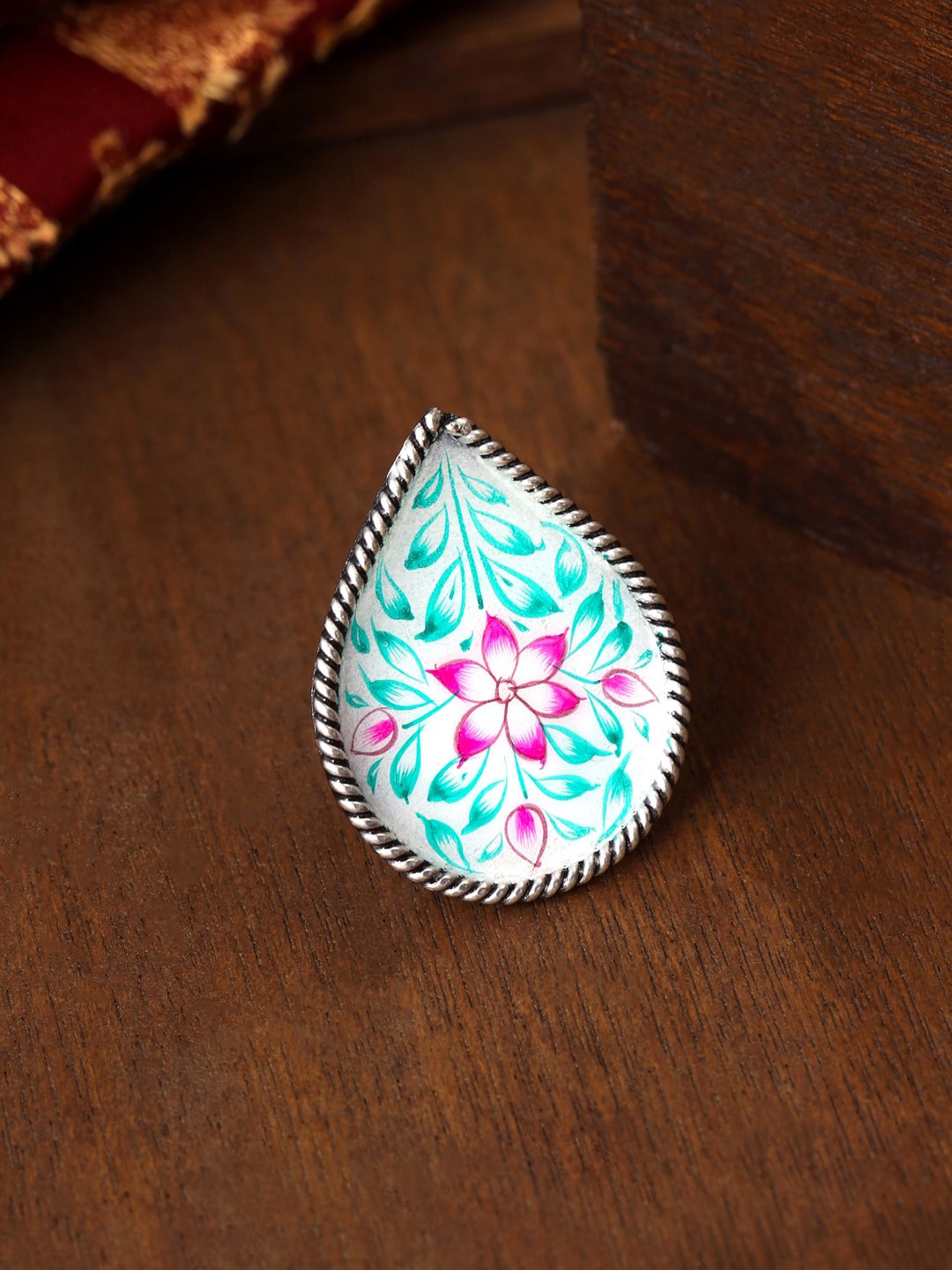 

Yellow Chimes Oxidised Silver-Toned & White Meenakari Hand Painted Finger Ring