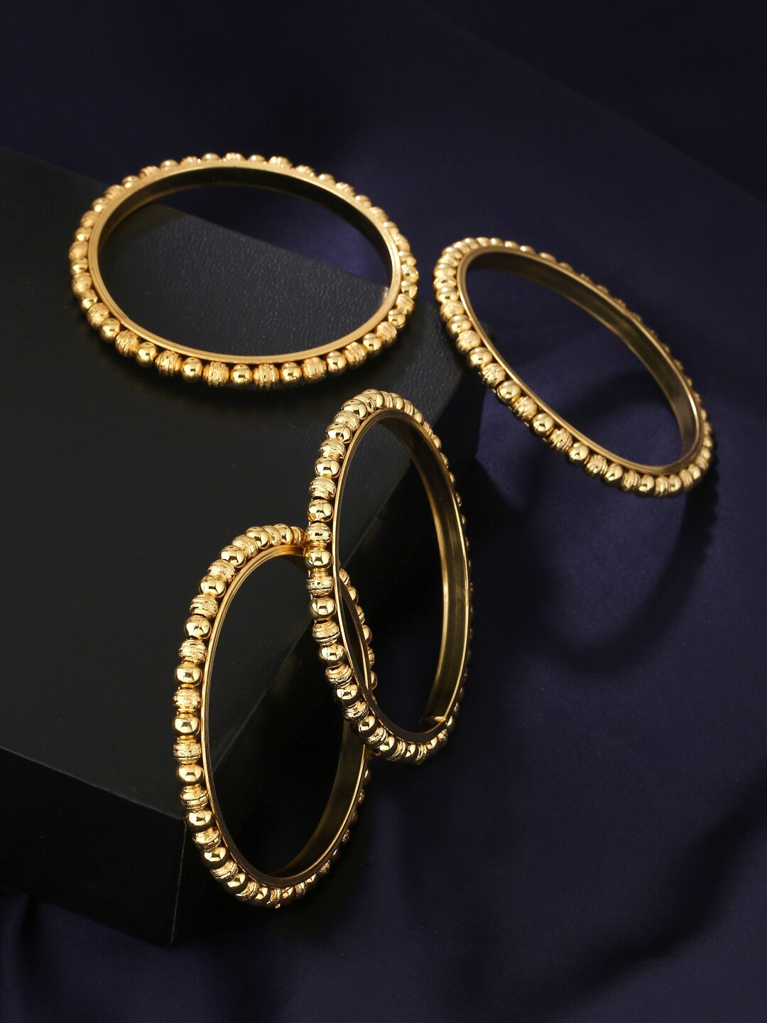 

Yellow Chimes Set Of 4 Gold-Plated Traditional Bangles