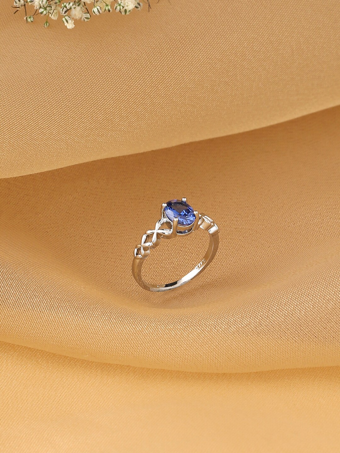 

Unwind by Yellow Chimes Silver-Plated Blue Crystal Studded Finger Ring