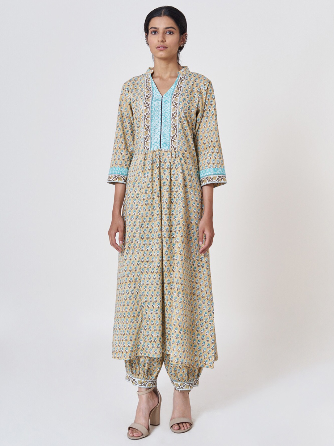 

SHRINKHLA Women Mustard Yellow & Beige Printed Cotton A-line Kurta