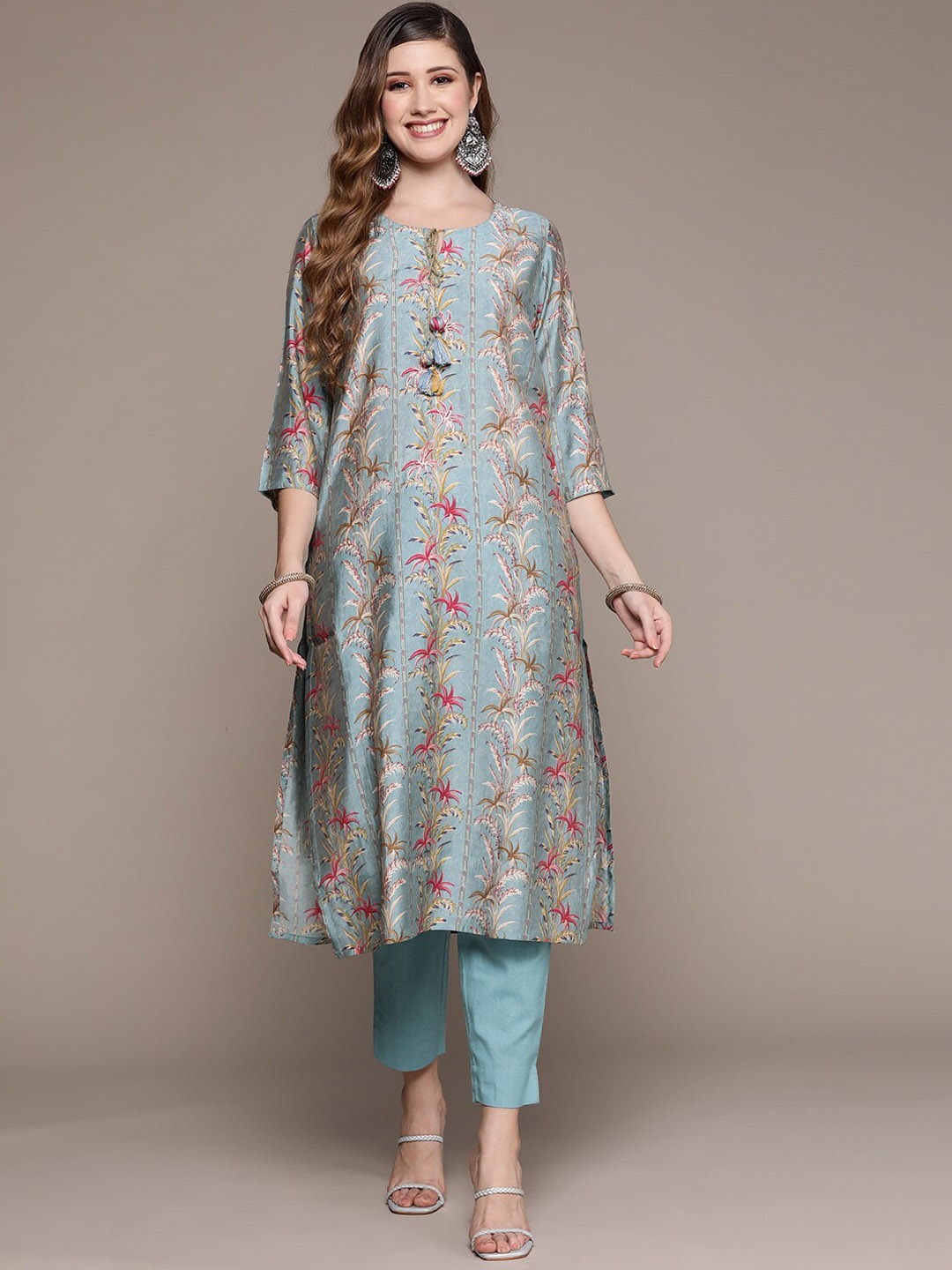 

Ishin Women Blue Floral Printed Layered Kurti with Trousers
