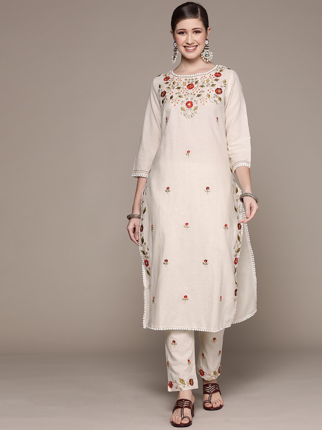 

Ishin Women Off White Floral Embroidered Pure Cotton Kurti with Palazzos