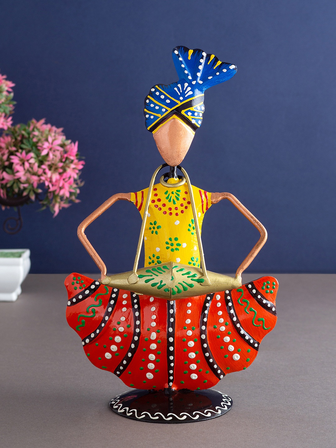

Golden Peacock Yellow & Orange Musician Figurine Showpieces
