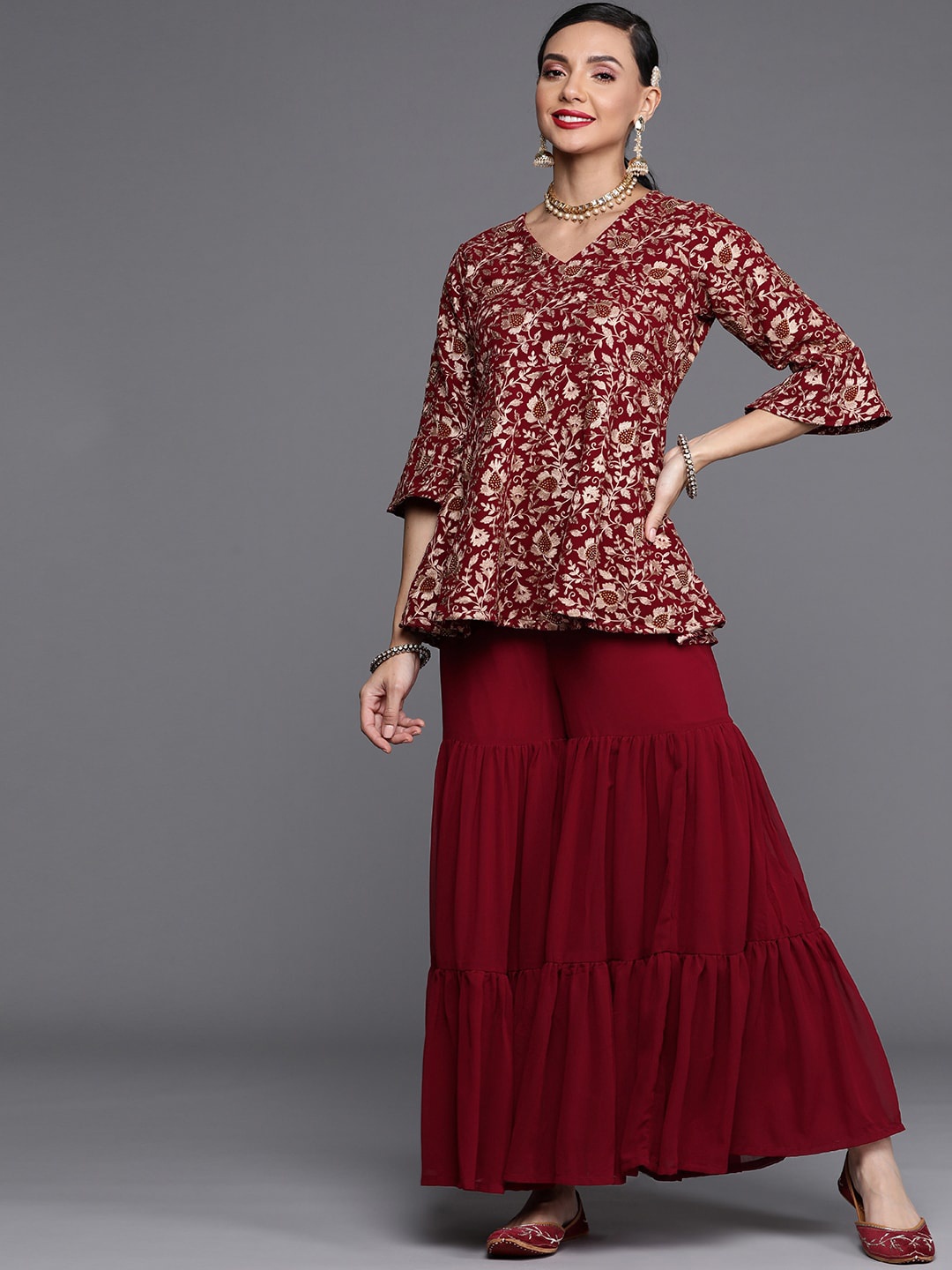 

Libas Women Maroon Floral Printed Angrakha Kurta with Sharara