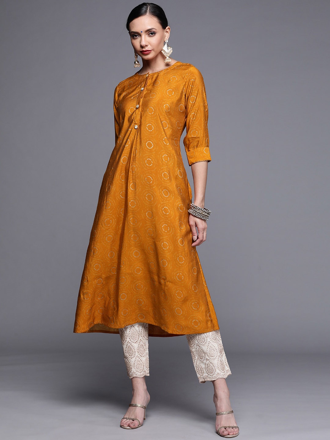 

Libas Women Yellow Geometric Printed Chanderi Silk Kurta