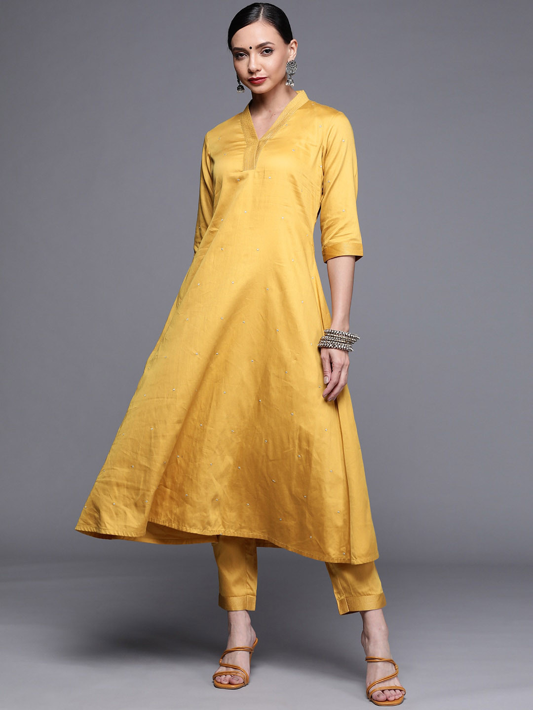 

Libas Women Yellow Chanderi Silk Kurta