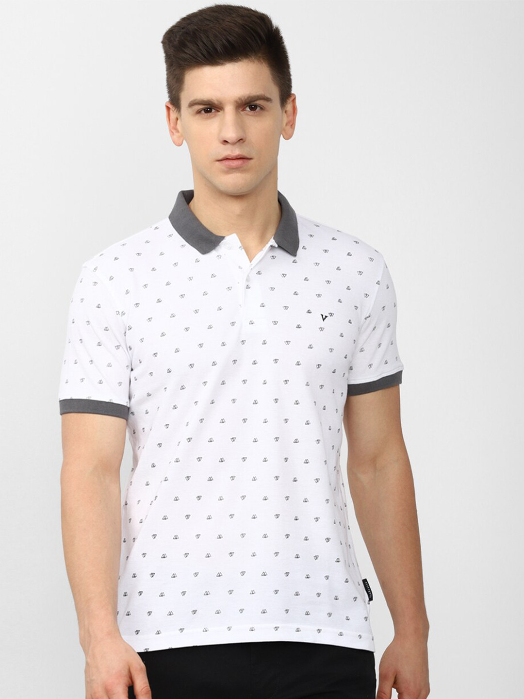 

Van Heusen Sport Men White Printed Polo Collar T-shirt