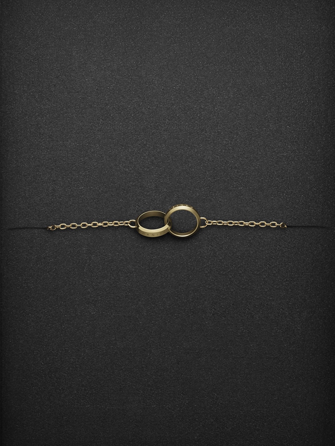 

Daniel Wellington Women Gold-Toned Charm Bracelet