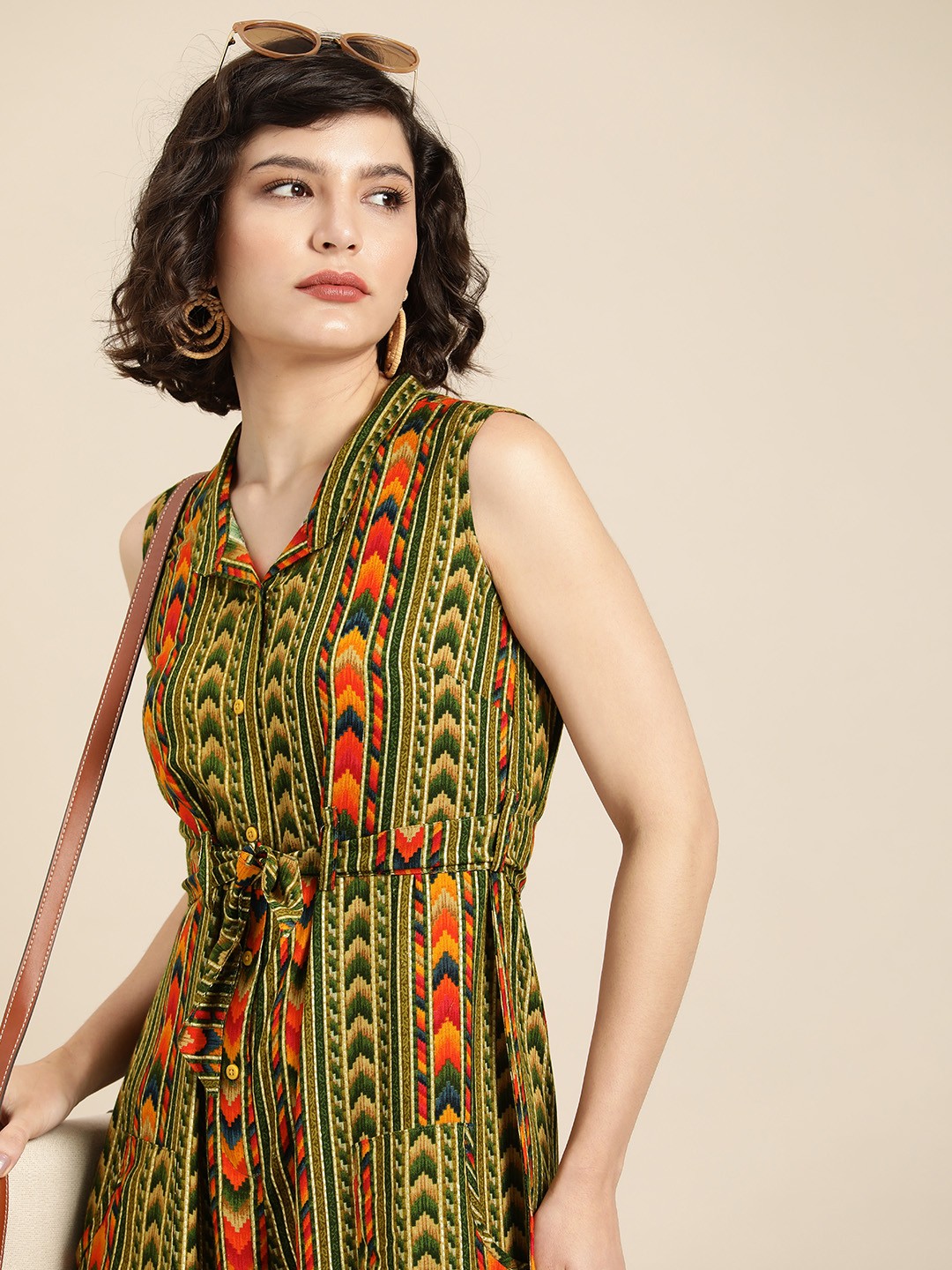 

Sangria Women Beige & Green Abstract Print Basic Jumpsuit