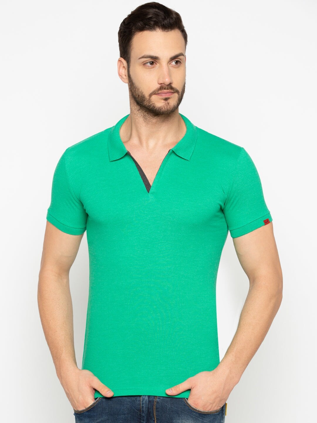 

Status Quo Men Green Solid Cotton Polo Collar T-shirt