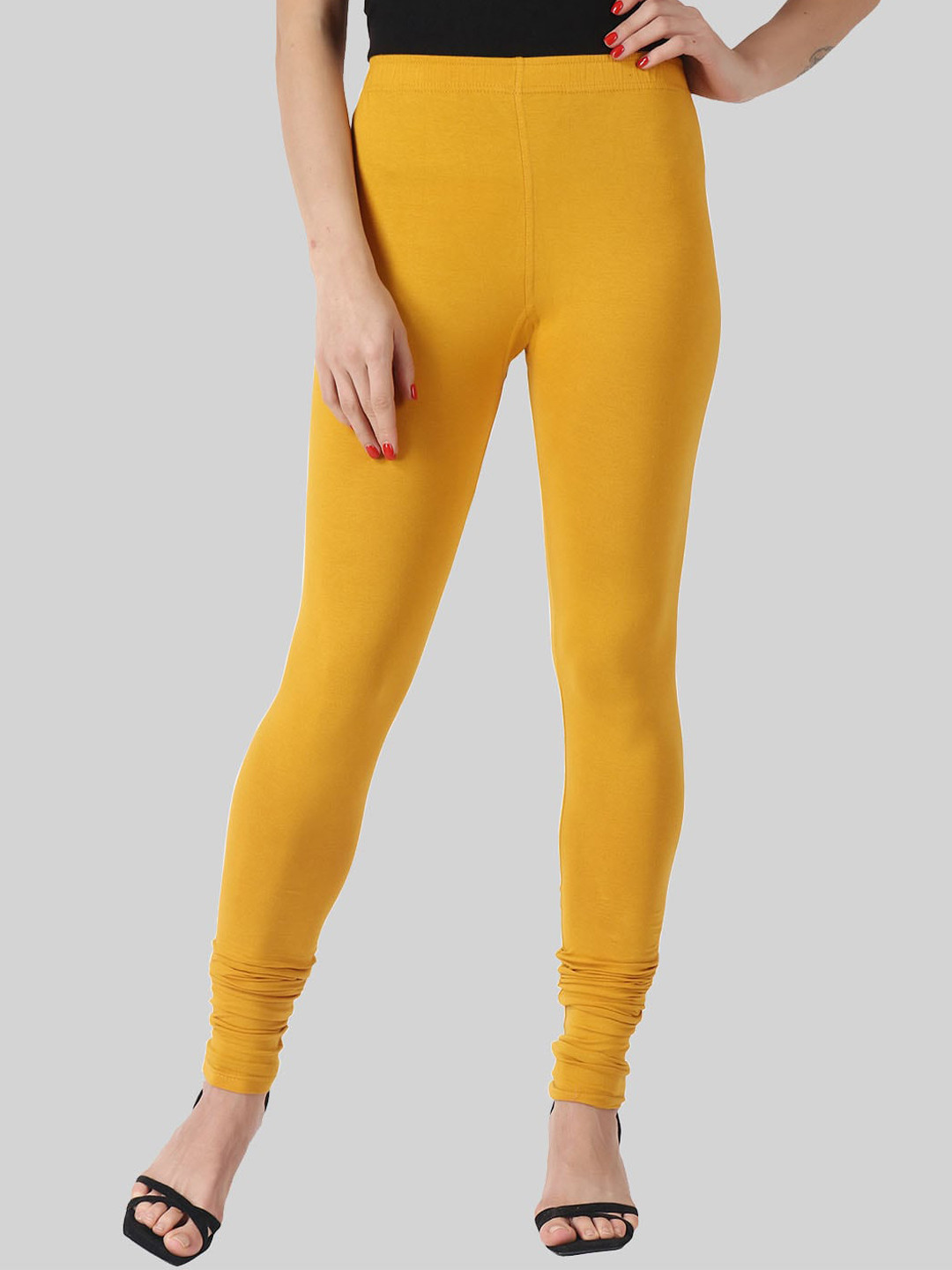

SAUNDARYA Women Yellow Solid Churidar-Length Leggings