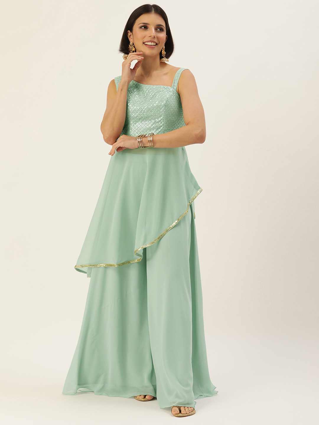 

Ethnovog Women Sea Green Embroidered Sequinned Kurti with Palazzos