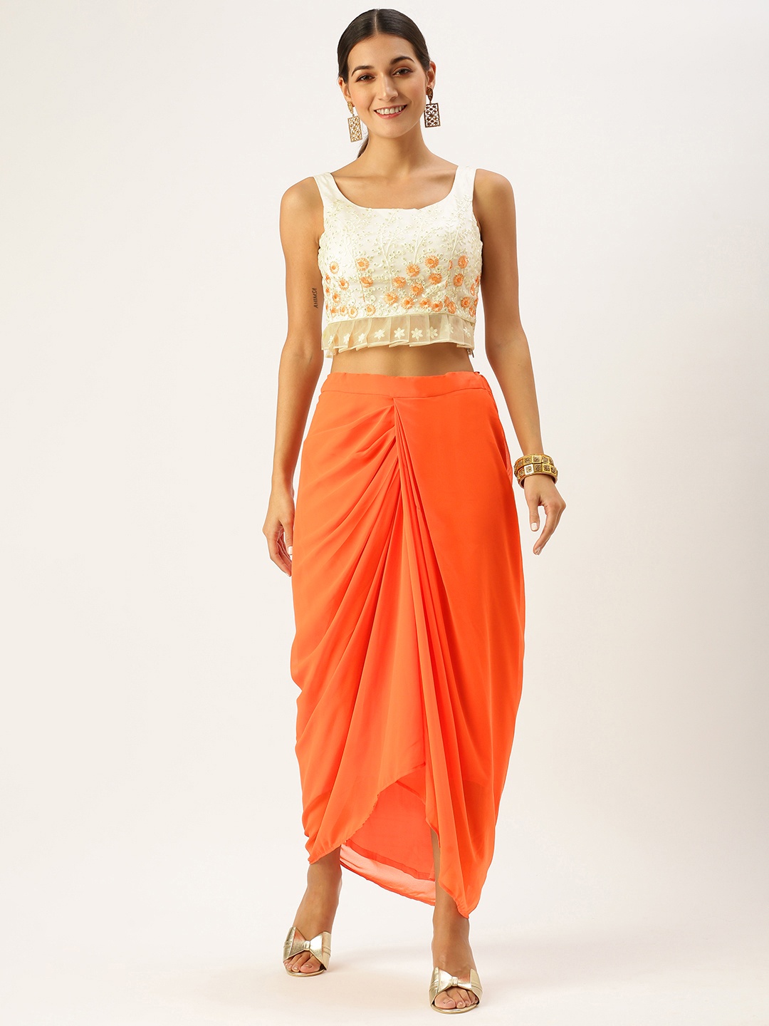 

Ethnovog Off White Orange Embroidered Thread Work Made to Measure Lehenga Blouse