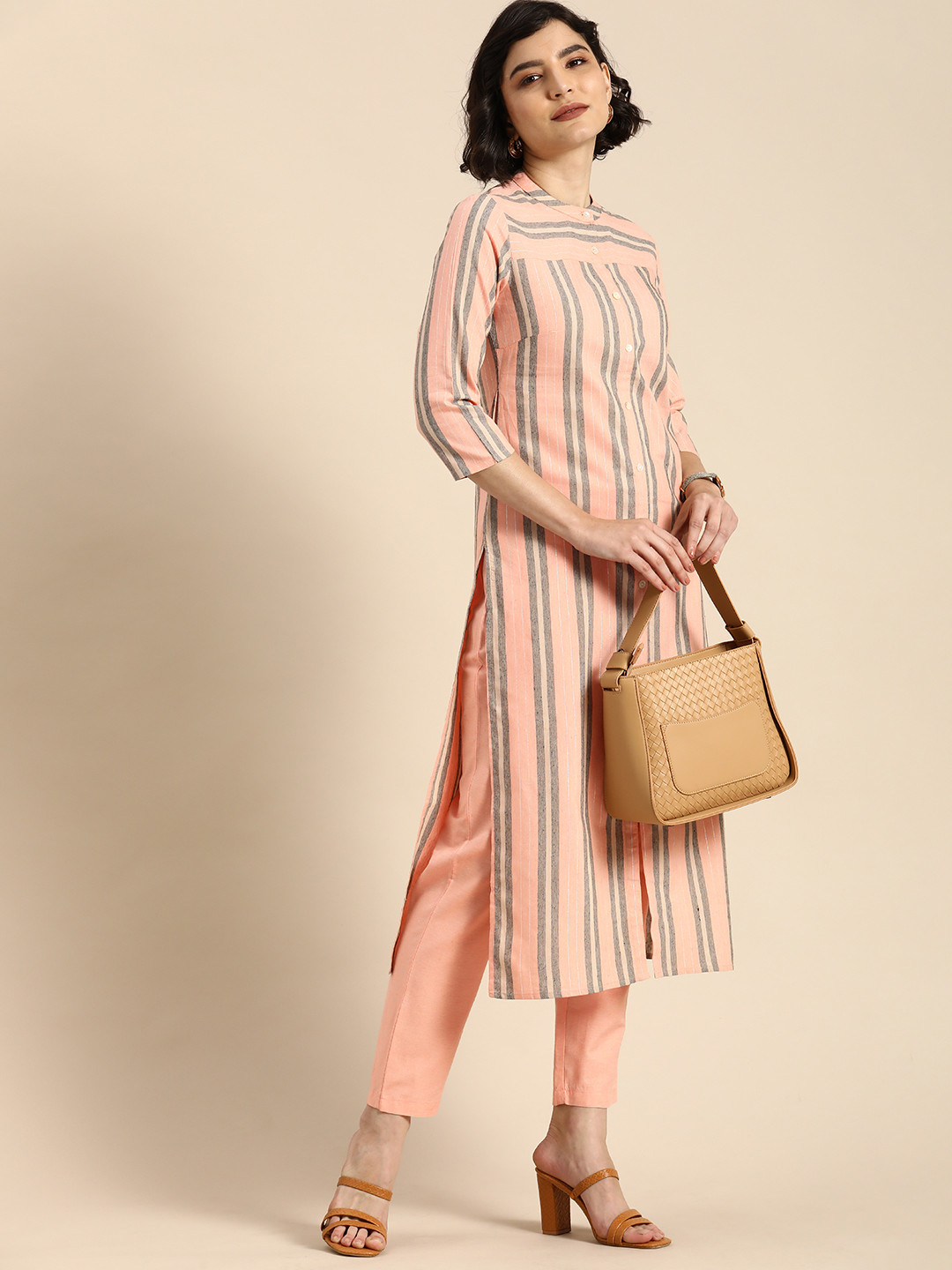 

Anouk Women Peach-Coloured & Beige Striped Kurta with Trousers