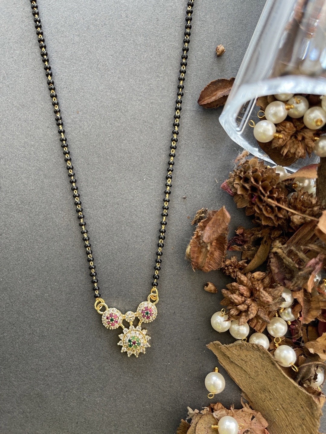 

Digital Dress Room Gold-Plated White & Black AD-Studded Beaded Mangalsutra
