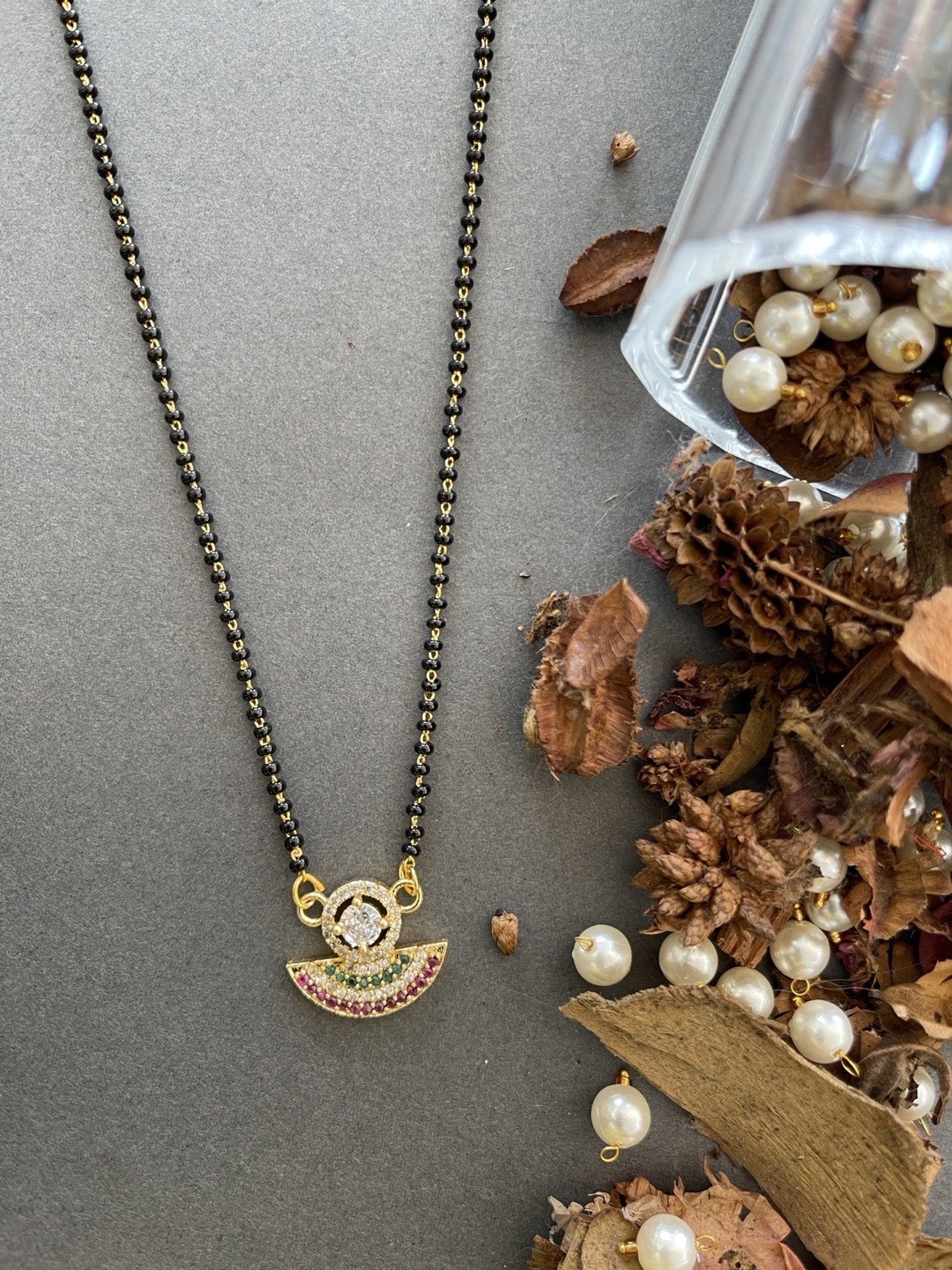 

Digital Dress Room Gold-Plated White & Black AD-Studded Beaded Mangalsutra