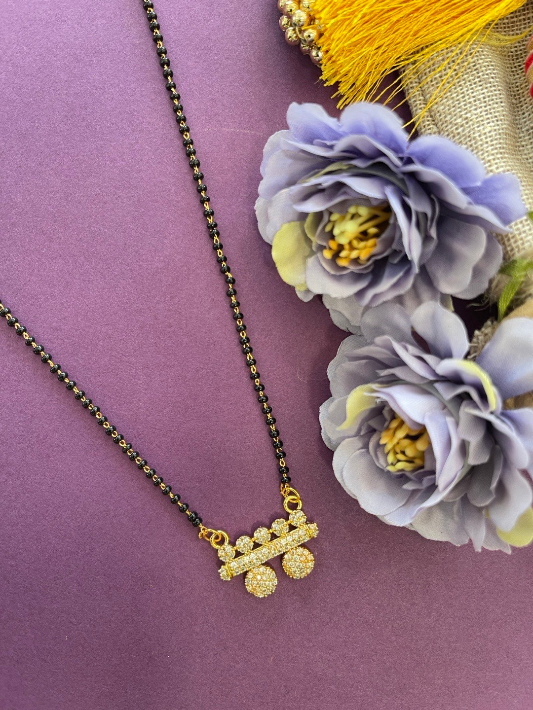 

Digital Dress Room Gold-Plated & Black Beaded Mangalsutra