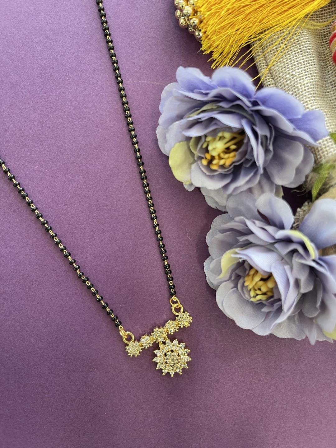 

Digital Dress Room Gold-Plated & Black Beaded Mangalsutra