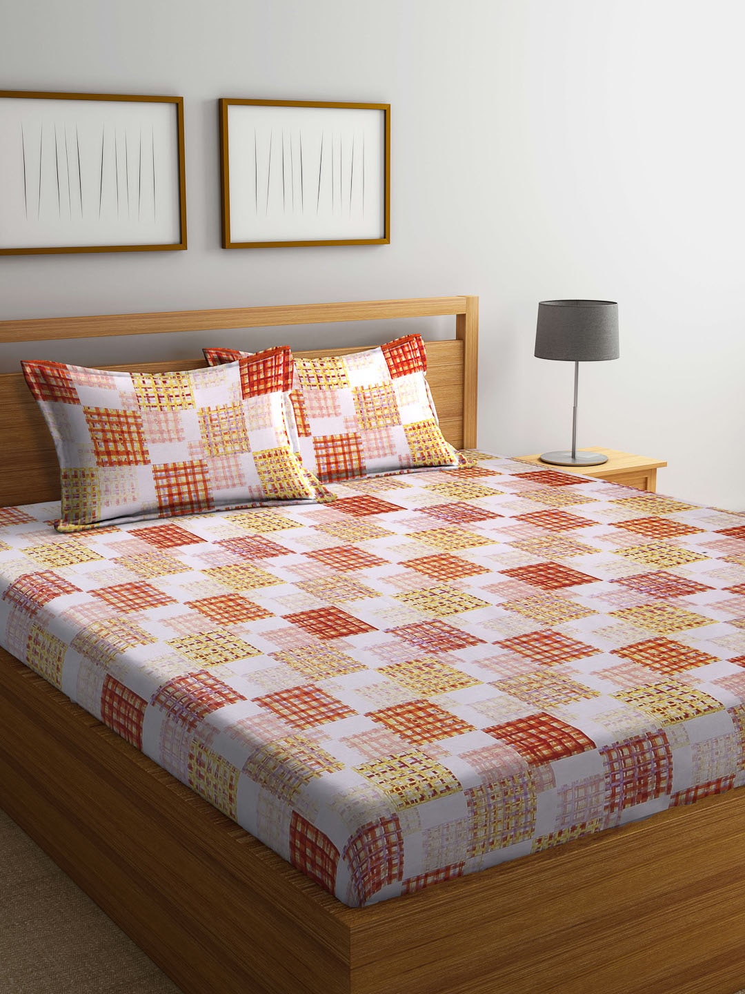 

BOMBAY DYEING Orange & White Geometric 144 TC Queen Bedsheet with 2 Pillow Covers