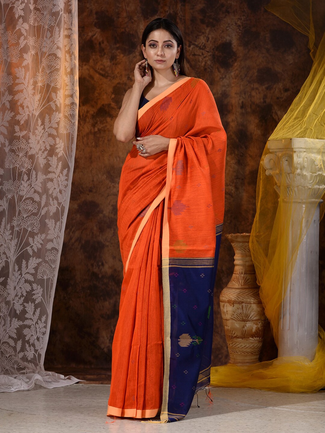 

Mitera Orange & Blue Floral Saree