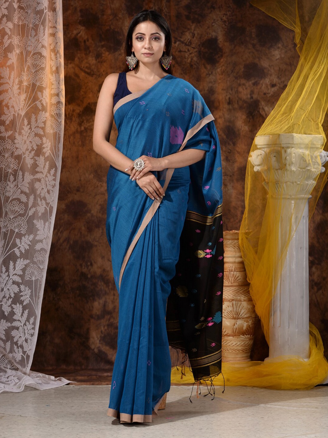 

Mitera Turquoise Blue & Black Floral Heavy Work Saree
