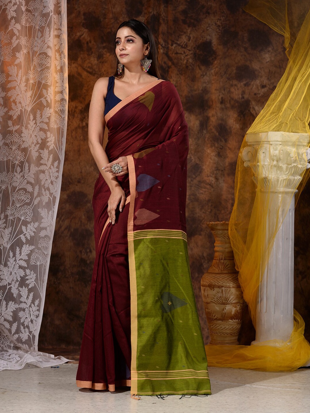 

Mitera Maroon & Green Dhakai Pattern Saree