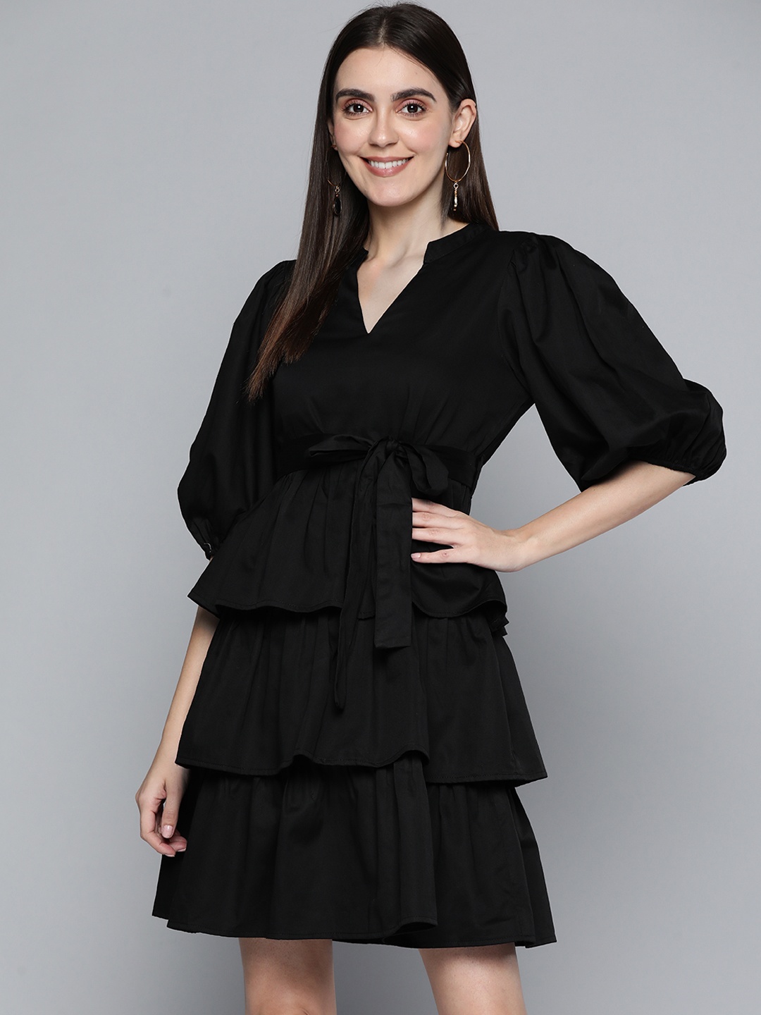 

Femella Women Black Solid Pure Cotton Tiered A-Line Dress with Belt