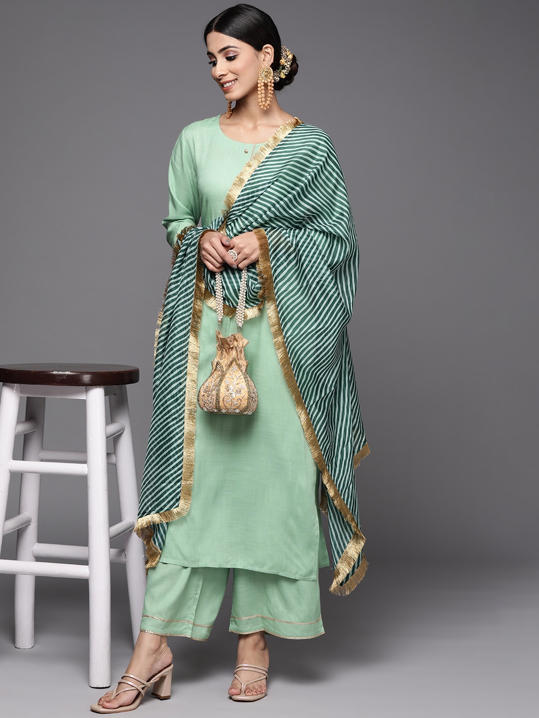 

Varanga Women Green Solid Gotta Patti Detail Empire Kurta with Palazzos & With Dupatta