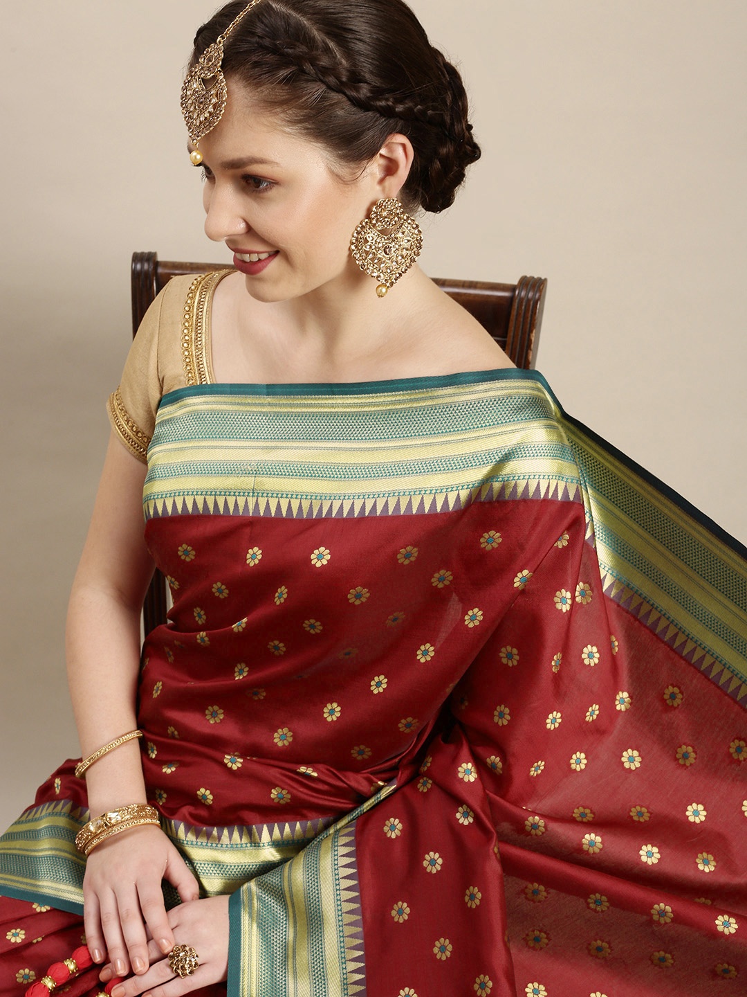 

Rudra Fashion Red & Turquoise Blue Ethnic Motifs Silk Blend Banarasi Saree