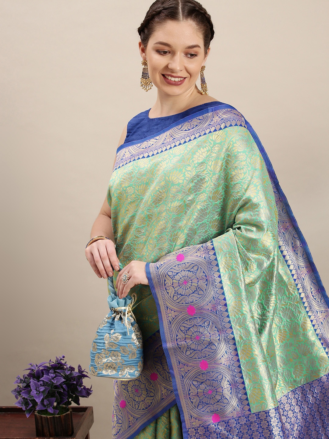 

Rudra Fashion Turquoise Blue & Gold-Toned Ethnic Motifs Silk Blend Banarasi Saree