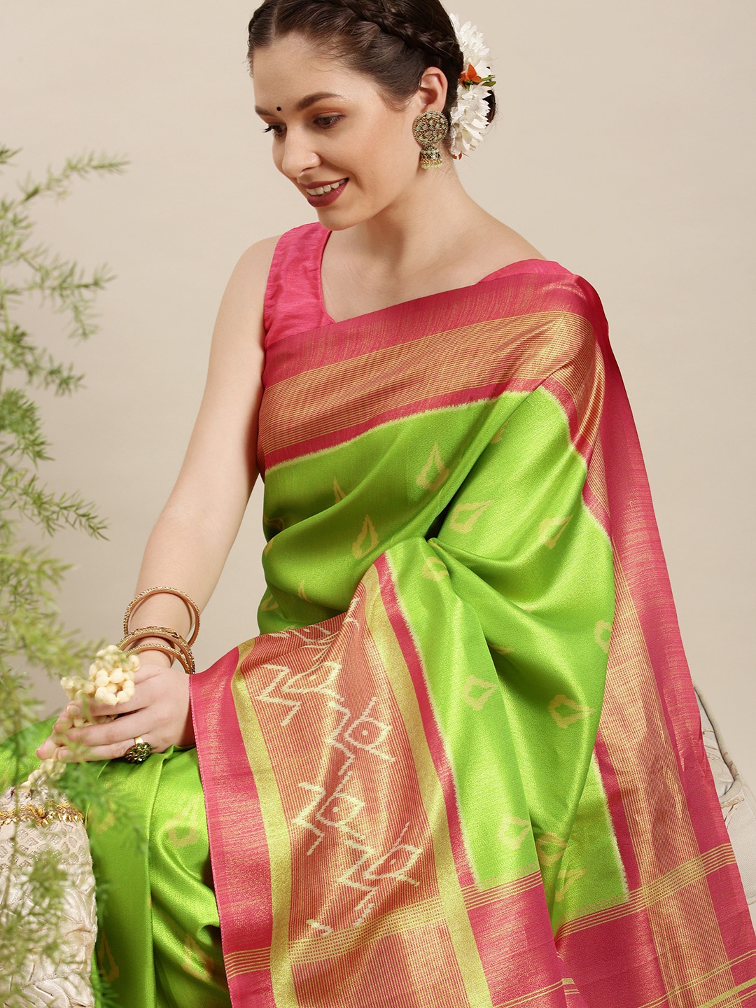 

Rudra Fashion Green & Pink Ethnic Motifs Silk Blend Saree