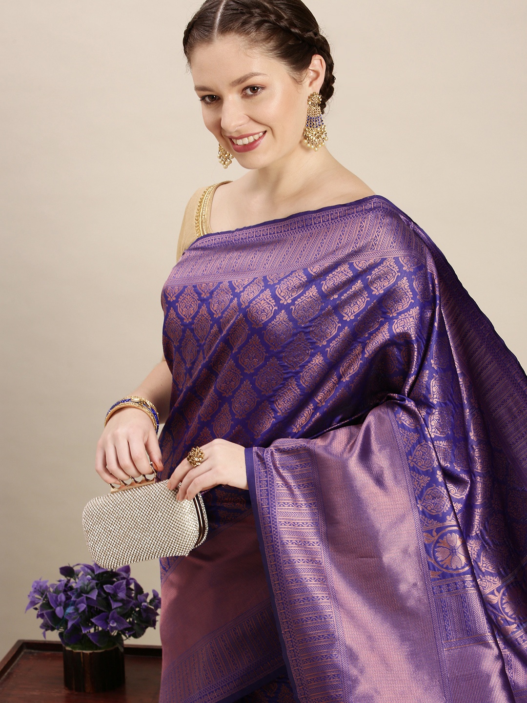 

Rudra Fashion Blue & Purple Ethnic Motifs Silk Blend Banarasi Saree