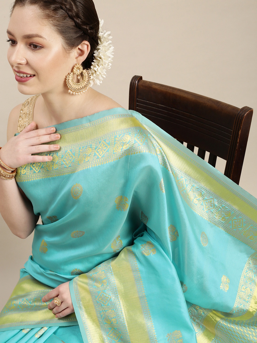 

Rudra Fashion Turquoise Blue & Gold-Toned Ethnic Motifs Silk Blend Banarasi Saree