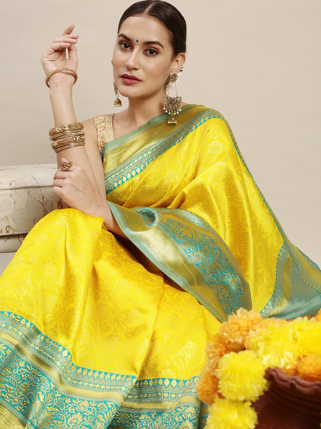 

Rudra Fashion Yellow & Turquoise Blue Ethnic Motifs Silk Blend Banarasi Saree