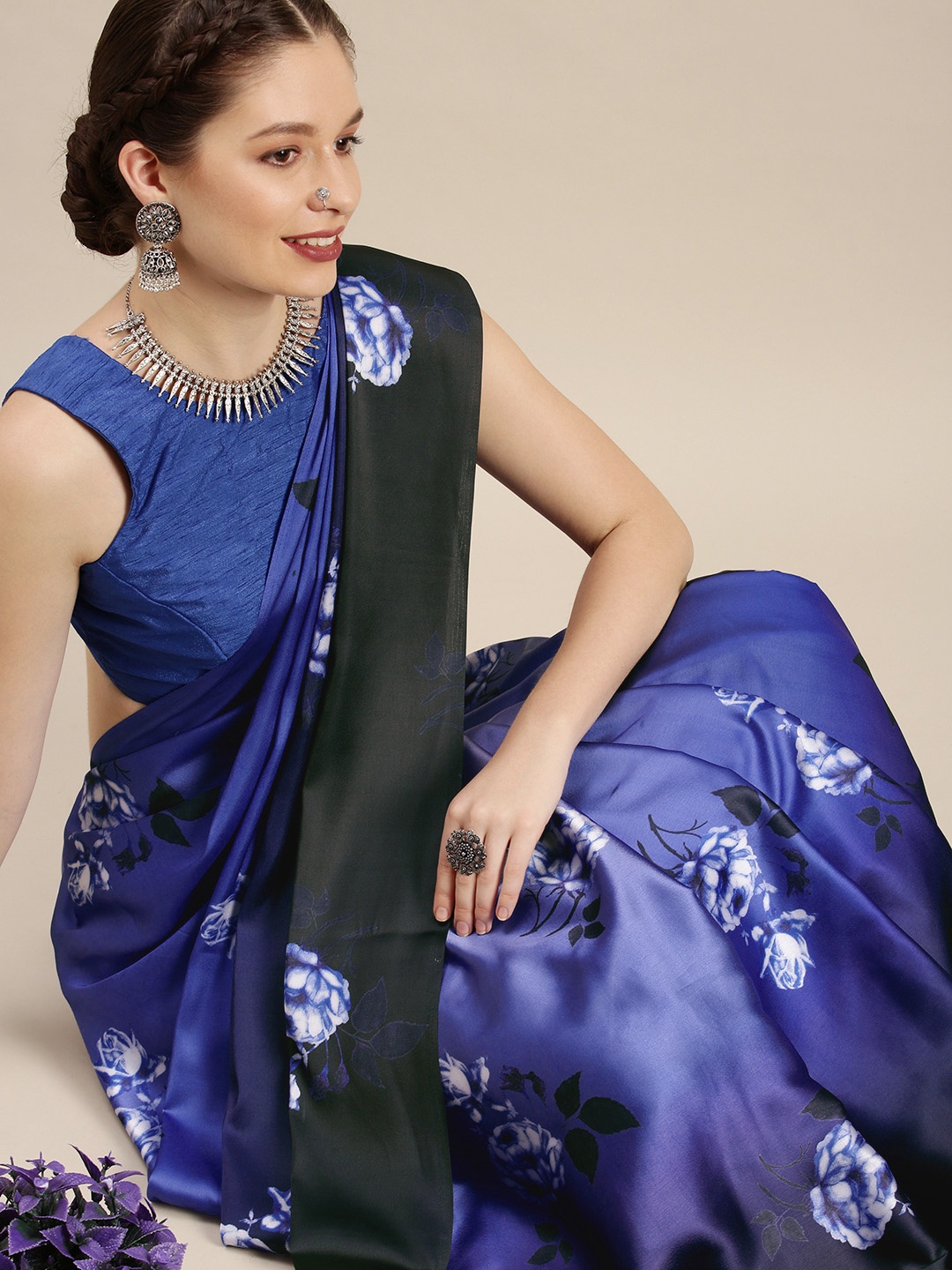 

Rudra Fashion Blue Floral Satin Ikat Saree