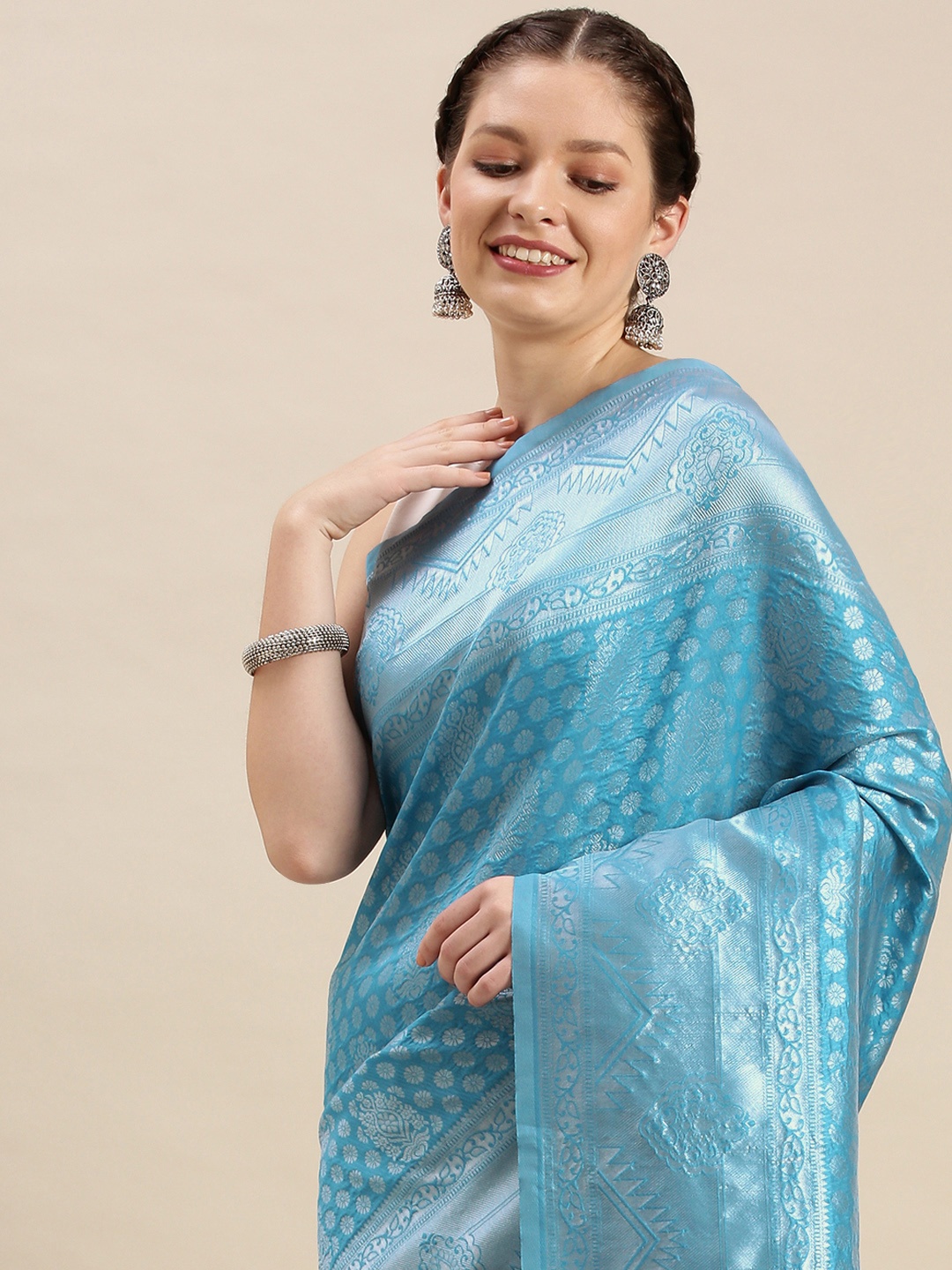 

Rudra Fashion Blue & Silver-Toned Ethnic Motifs Silk Blend Banarasi Saree