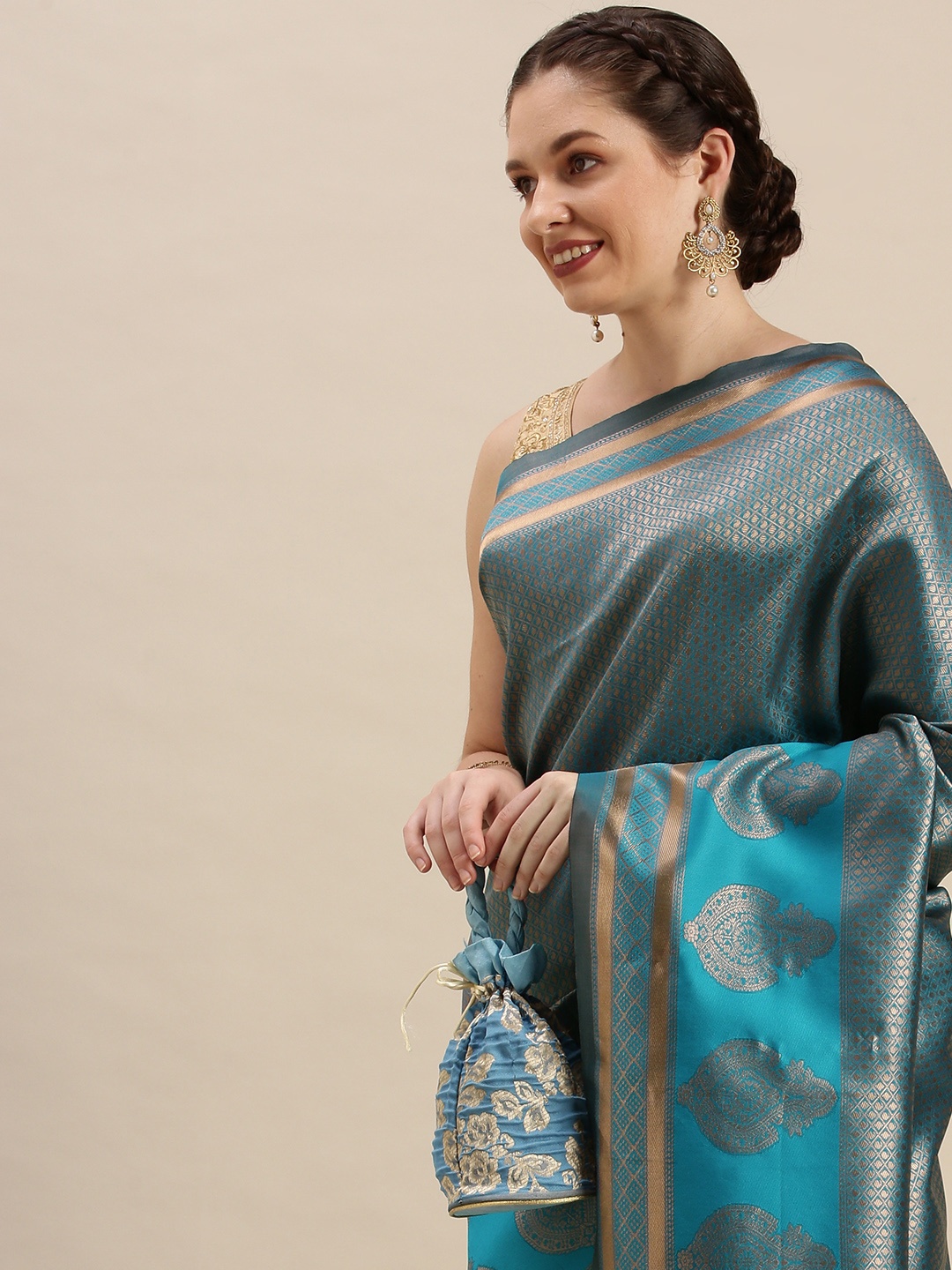 

Rudra Fashion Turquoise Blue & Gold-Toned Ethnic Motifs Silk Blend Banarasi Saree