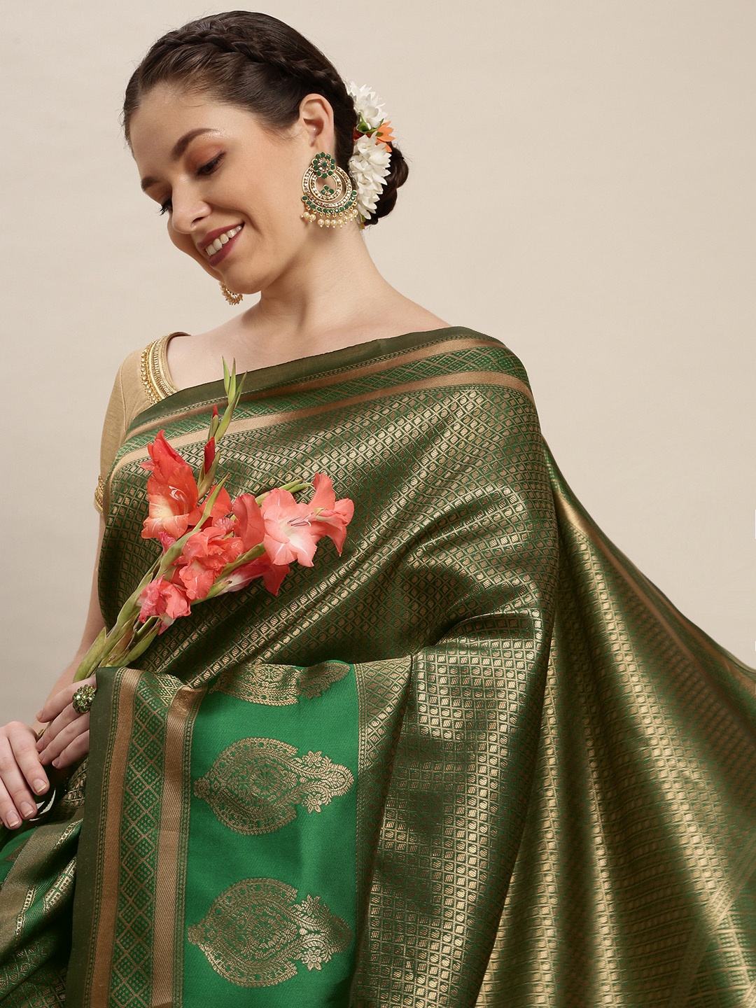 

Rudra Fashion Green & Gold-Toned Ethnic Motifs Silk Blend Banarasi Saree