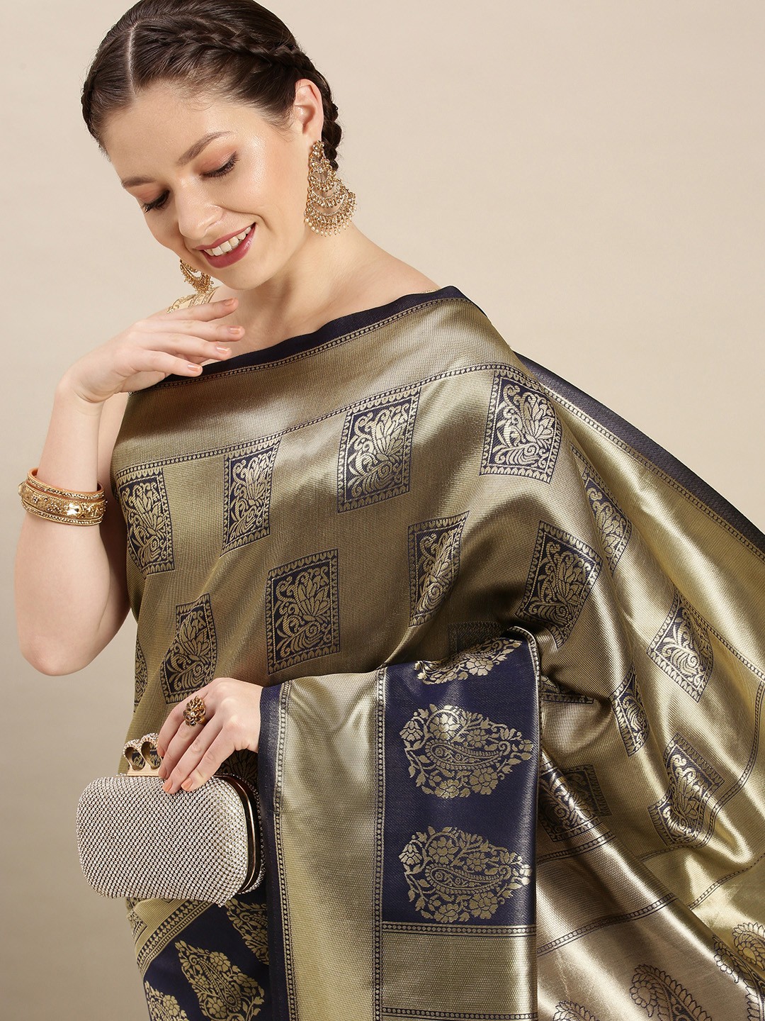 

Rudra Fashion Blue & Gold-Toned Ethnic Motifs Silk Blend Banarasi Saree