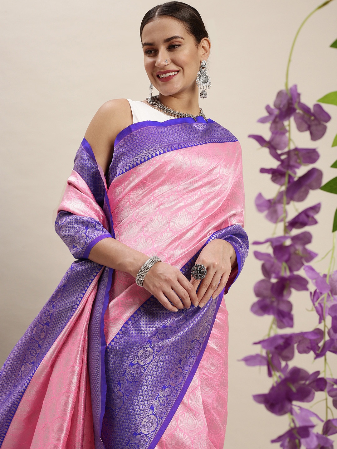 

Rudra Fashion Pink & Blue Ethnic Motifs Silk Blend Banarasi Saree