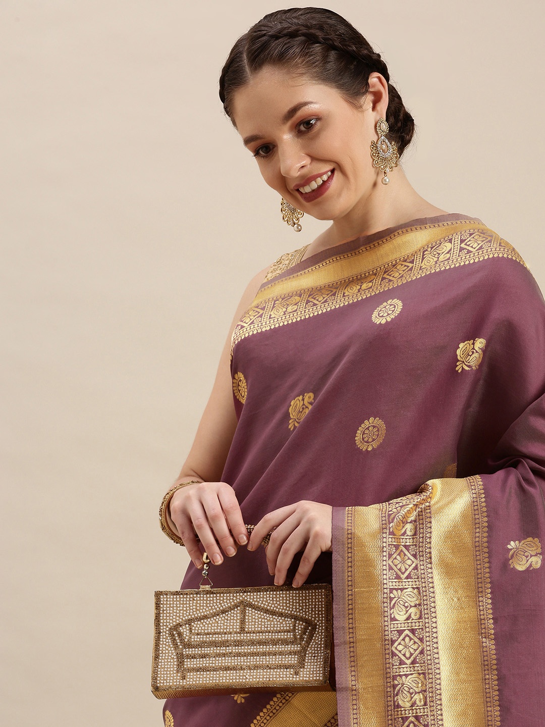 

Rudra Fashion Purple & Gold-Toned Ethnic Motifs Silk Blend Banarasi Saree