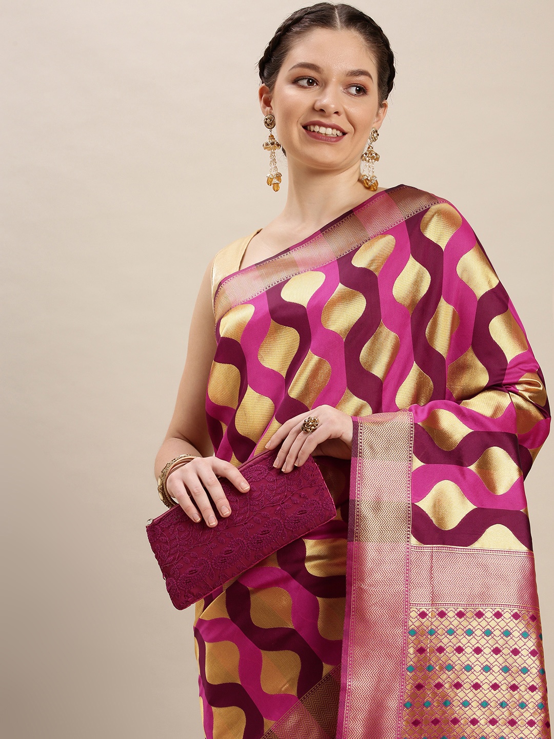 

Rudra Fashion Purple & Gold-Toned Ethnic Motifs Silk Blend Banarasi Saree