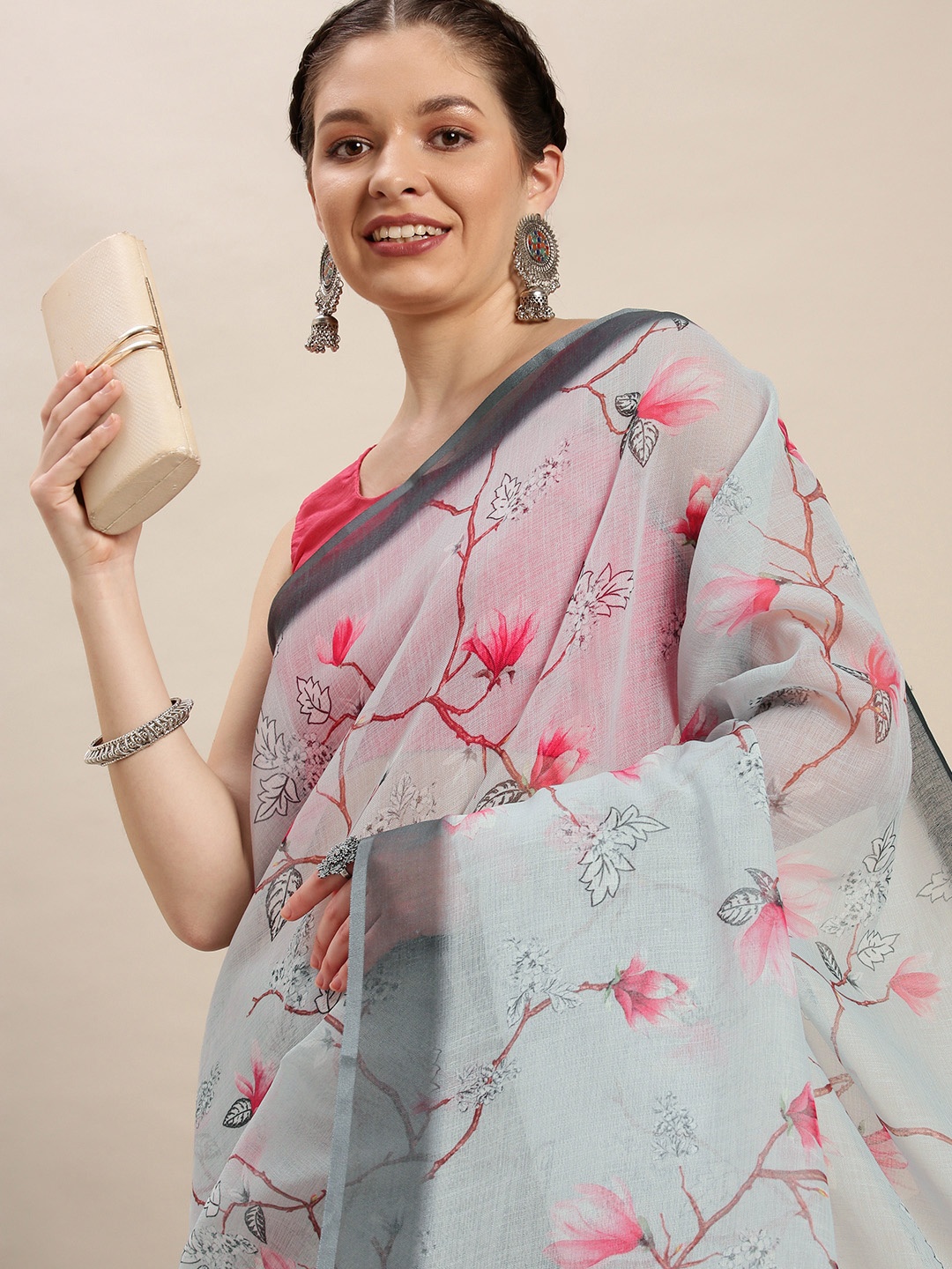 

Rudra Fashion Grey & Pink Floral Linen Blend Saree