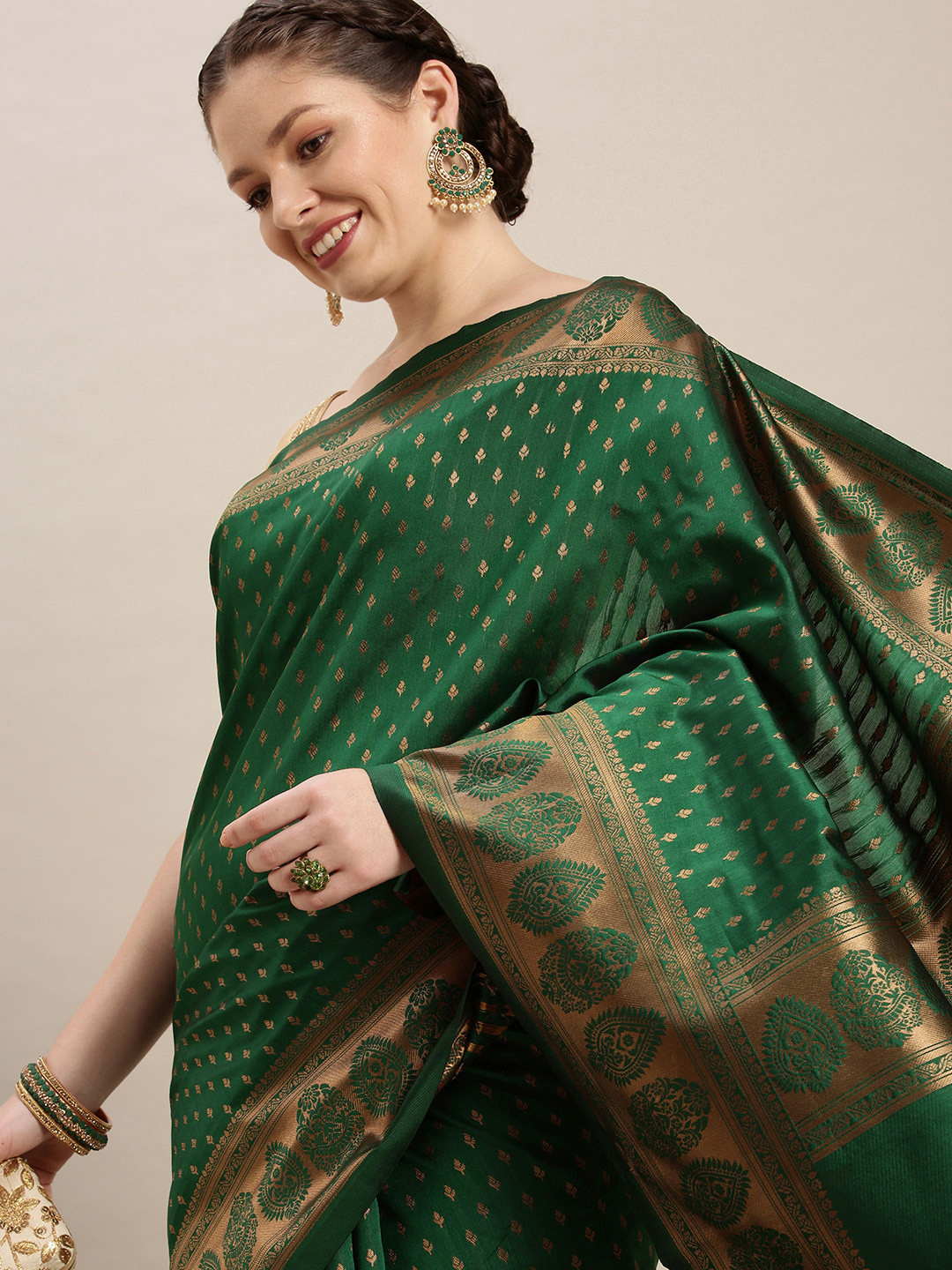 

Rudra Fashion Green & Gold-Toned Ethnic Motifs Silk Blend Banarasi Saree