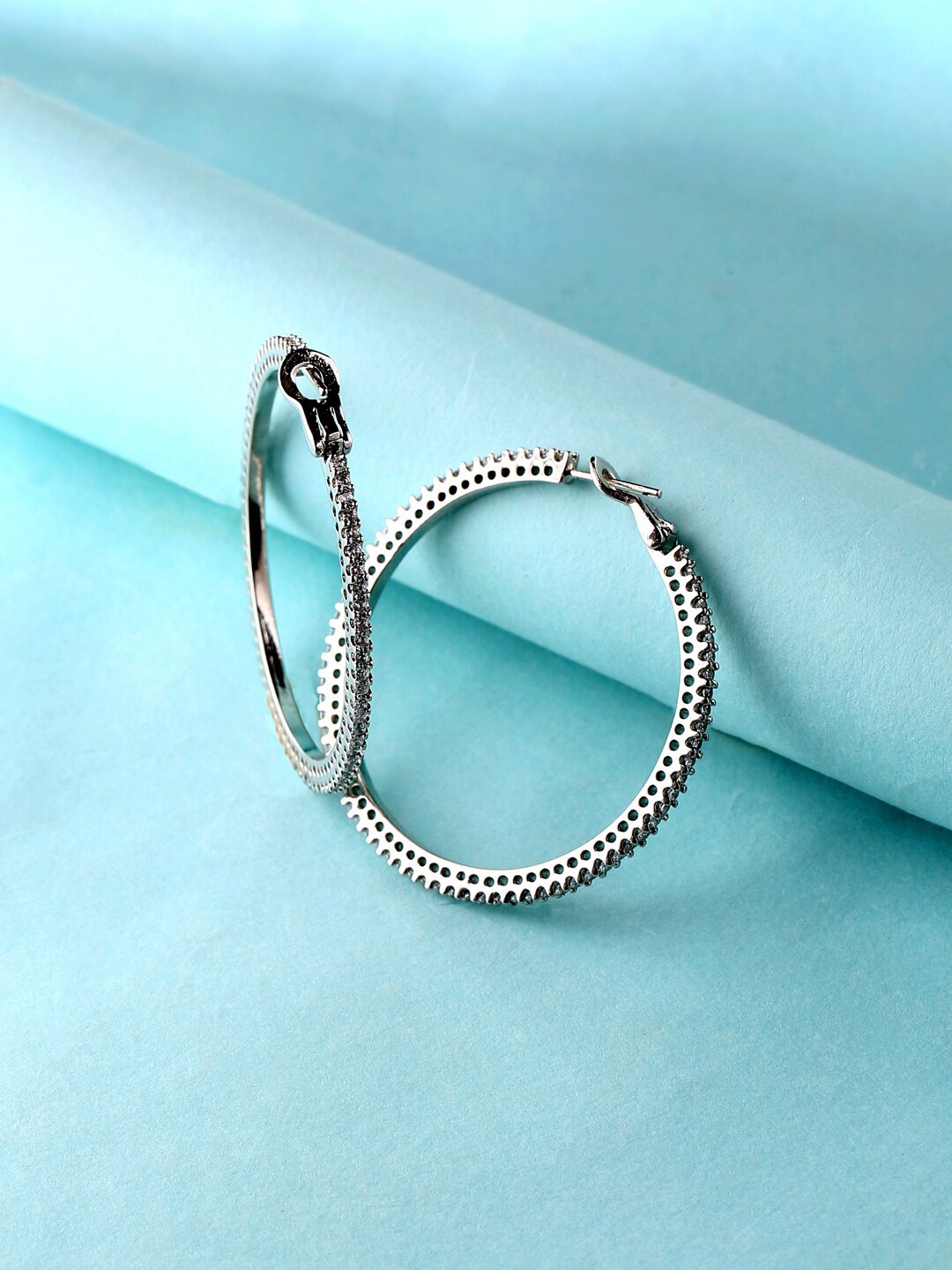 

ADORN by Nikita Ladiwala Silver-Toned Circular Hoop Earrings