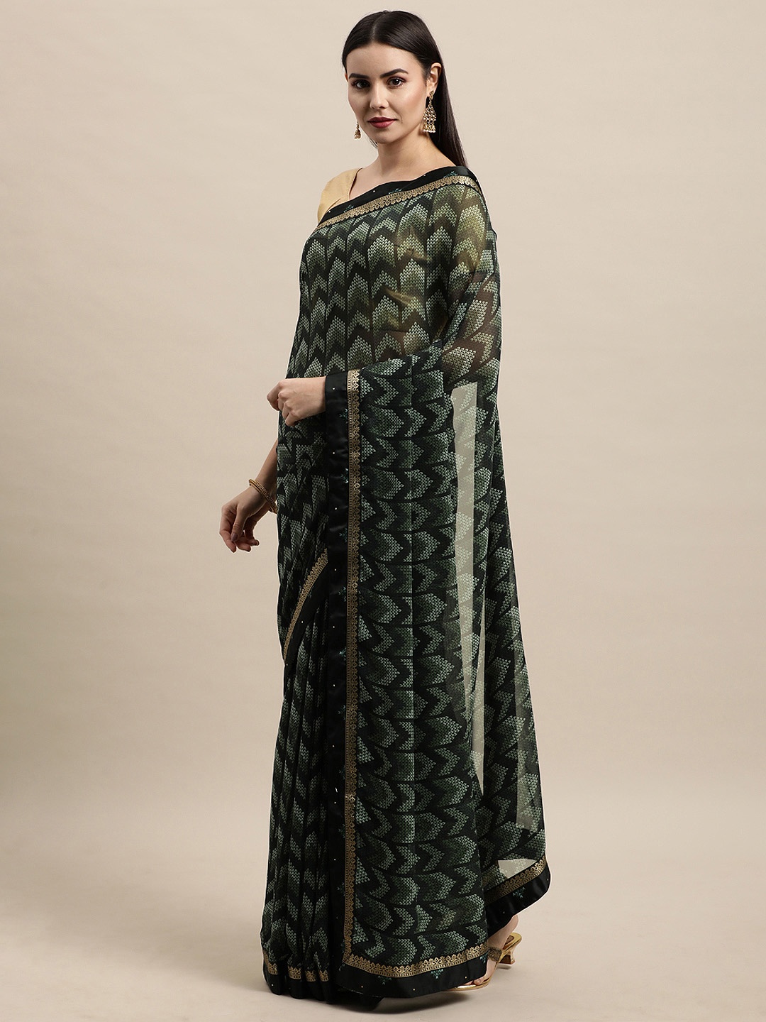 

Vishal Prints Navy Blue & Green Abstract Sequinned Saree