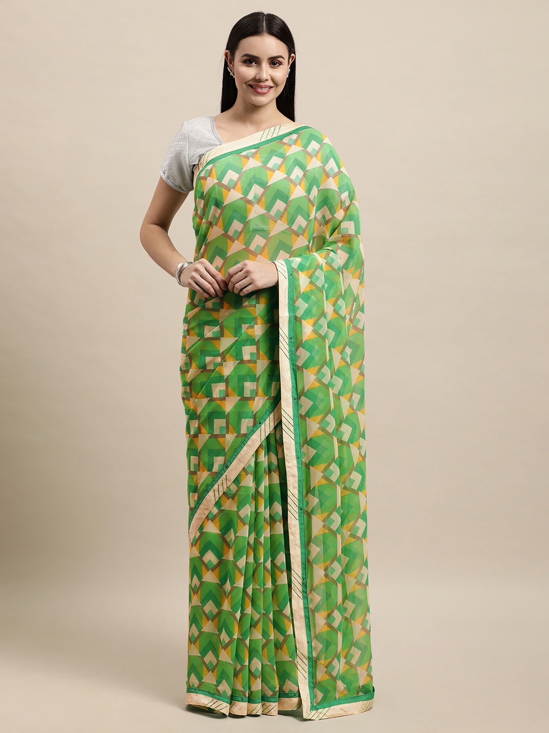 

Vishal Prints Green & Off White Abstract Print Saree